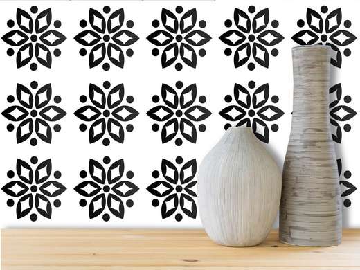Ceramic tiles with black floral ornaments
