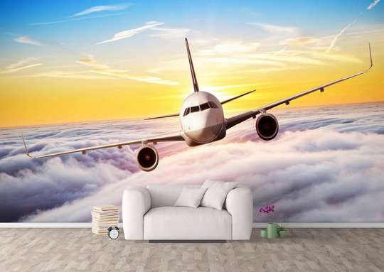 Wall Mural - Flying plane in the clouds.