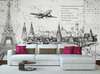 Wall Mural - Painted city with an airplane against a white brick wall