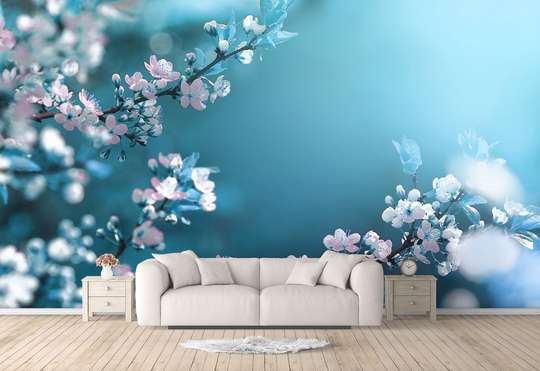 Wall Mural - White flowers on a branch on a blue background