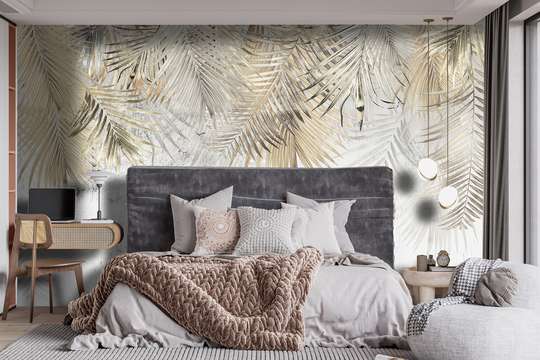 Wall Mural - Palm leaves on an abstract light background